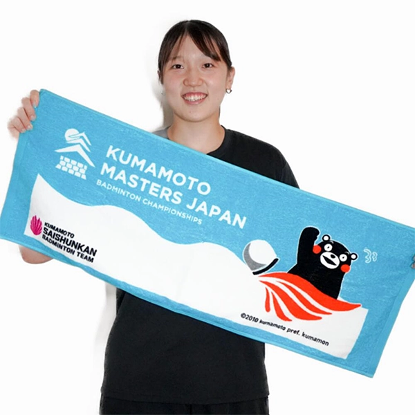 くまもと再春館製薬所バドミントンチーム公式 熊本マスターズジャパン ブルーフェイスタオル くまモンver.